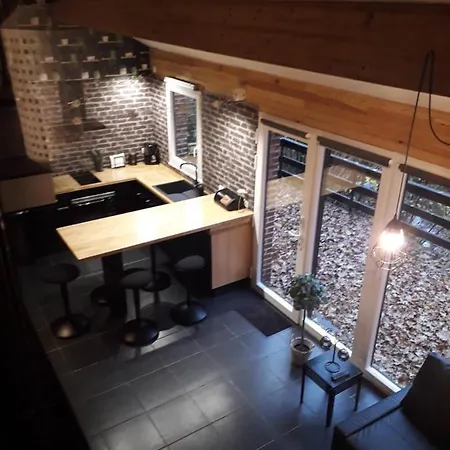 Dom wakacyjny Un Loft Perche Dans Les Bois